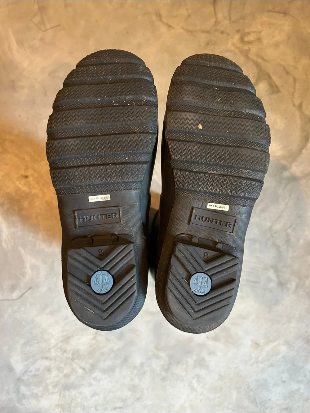 Hunter Tall Rubber Rain Boots in Gray.
